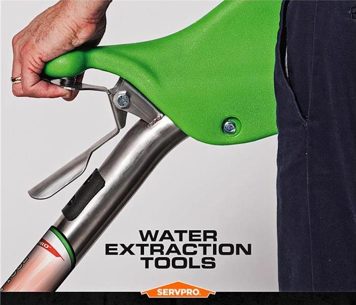 water extraction wand and handle servpro poster