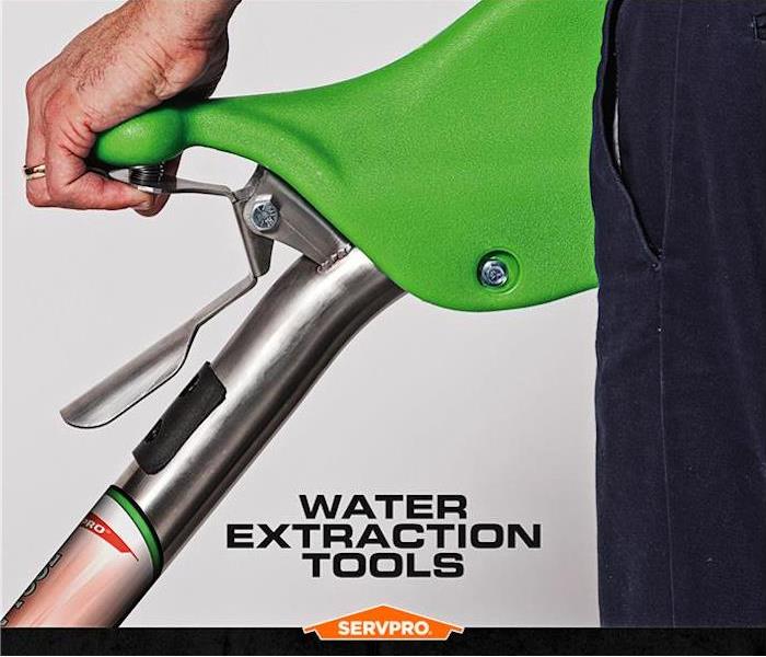 water extraction wand and handle servpro poster